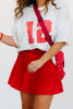 DOORBUSTER Moments Before High Waisted Pleated Ruby Lined Mini Skort